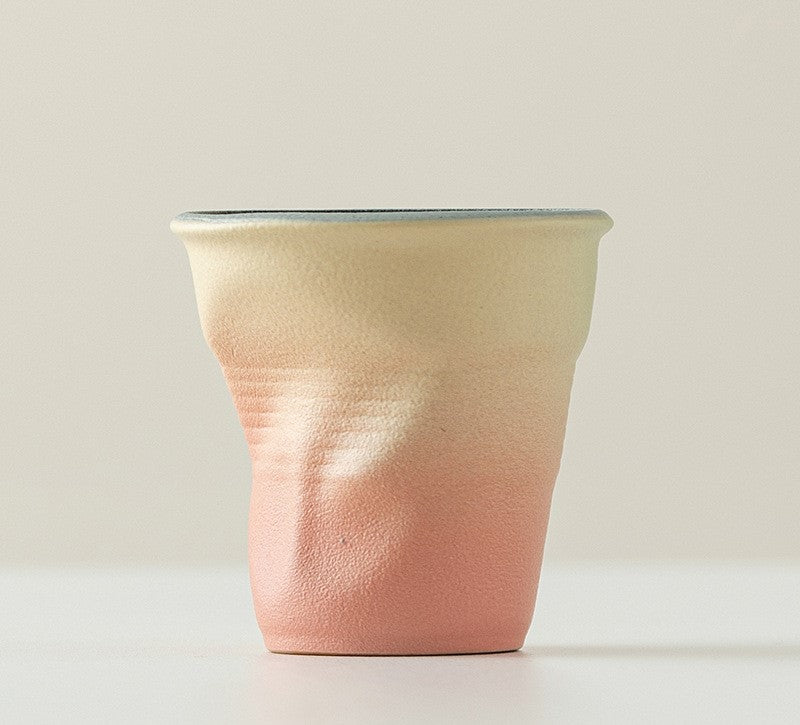 Folded Echo – Handcrafted Ceramic Coffee Cup with Origami Texture