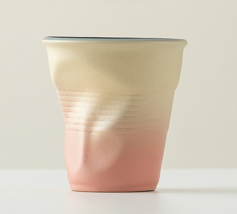 Folded Echo – Handcrafted Ceramic Coffee Cup with Origami Texture