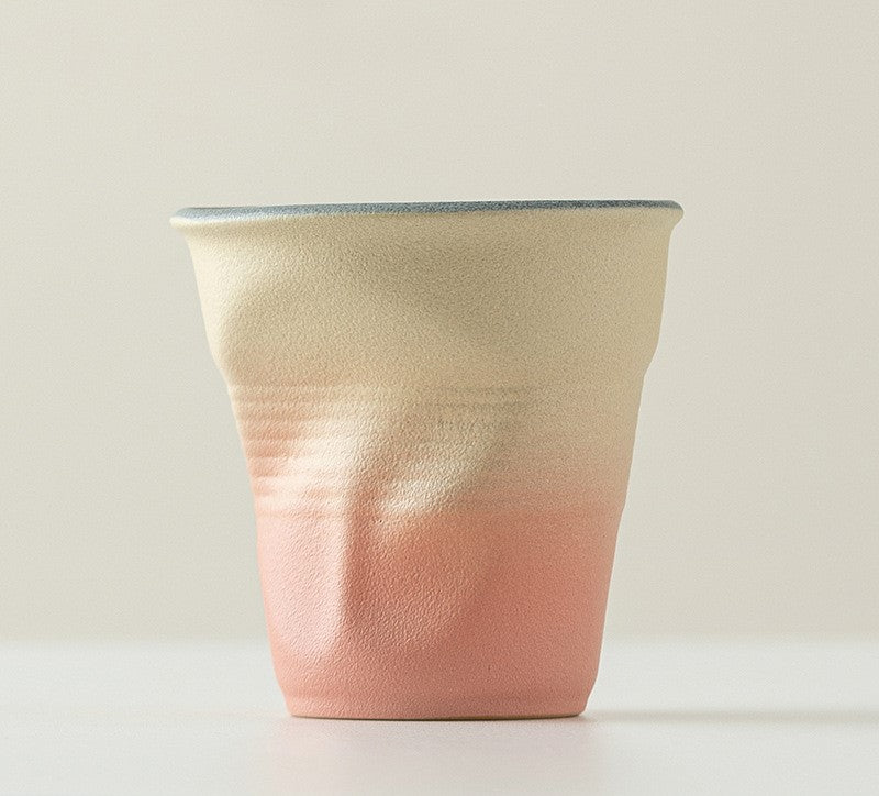 Folded Echo – Handcrafted Ceramic Coffee Cup with Origami Texture