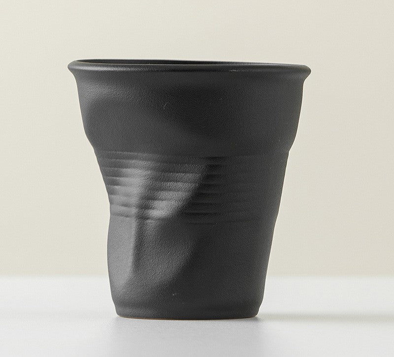 Folded Echo – Handcrafted Ceramic Coffee Cup with Origami Texture