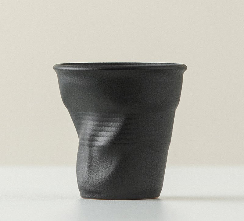 Folded Echo – Handcrafted Ceramic Coffee Cup with Origami Texture