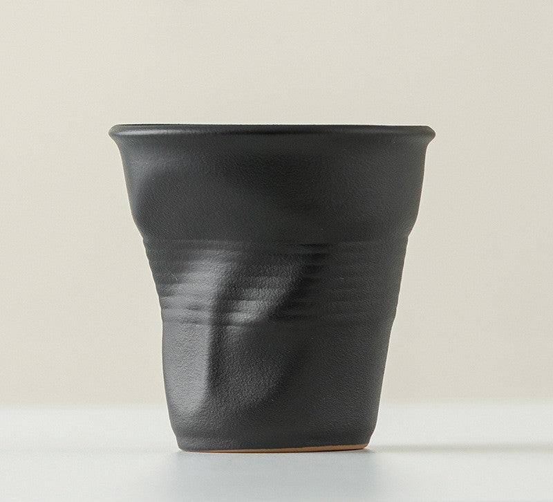 Folded Echo – Handcrafted Ceramic Coffee Cup with Origami Texture