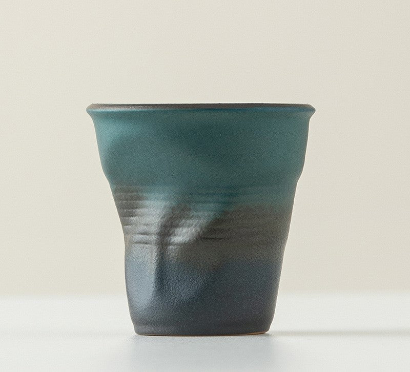 Folded Echo – Handcrafted Ceramic Coffee Cup with Origami Texture