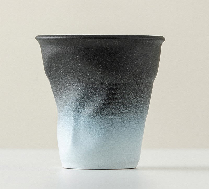 Folded Echo – Handcrafted Ceramic Coffee Cup with Origami Texture