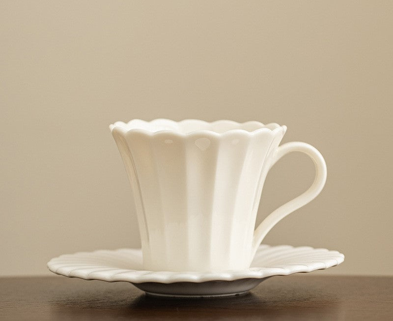 Blossom Whispers – Handcrafted Porcelain Coffee Cup & Saucer Set