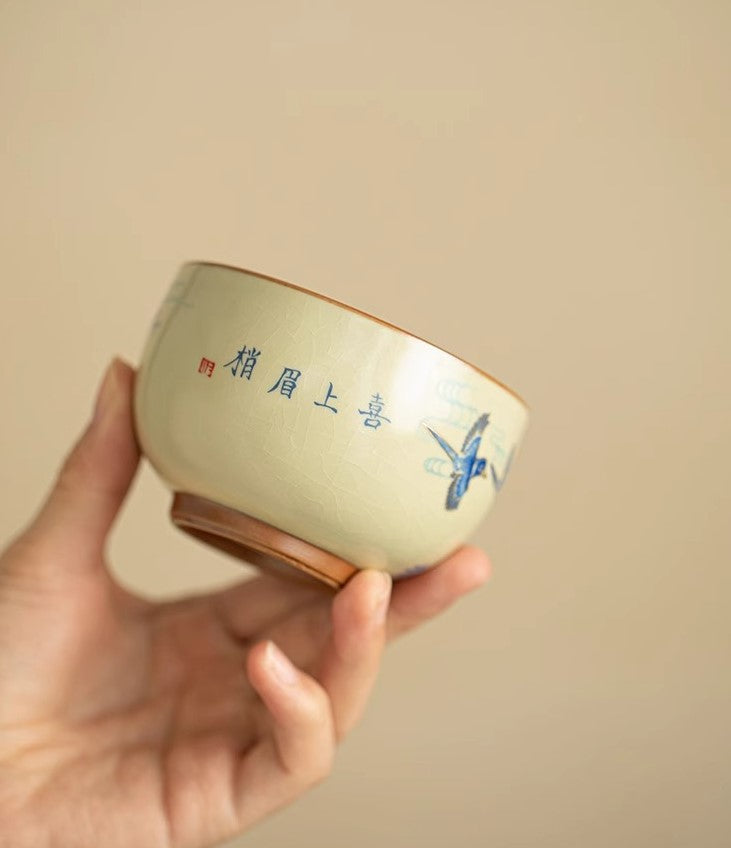 Joy Rising – Handcrafted Porcelain Tea Cup with Magpie & Plum Motif