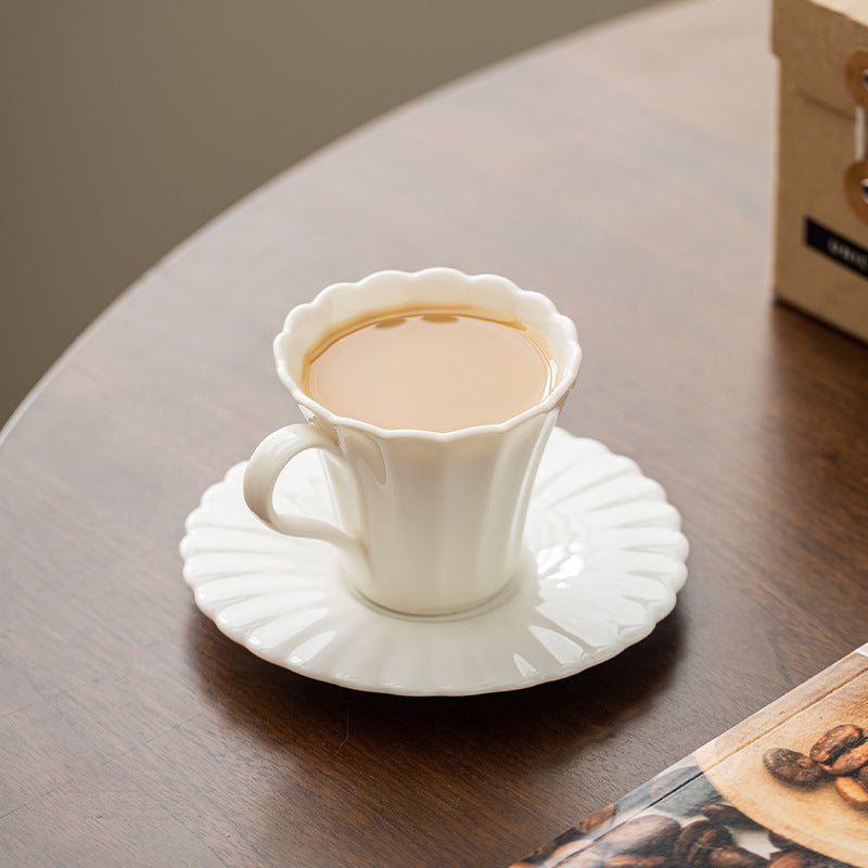 Blossom Whispers – Handcrafted Porcelain Coffee Cup & Saucer Set