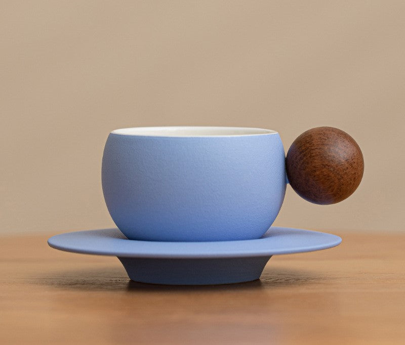 Orb Harmony – Handcrafted Ceramic Coffee Cup with Wooden Handle & Saucer