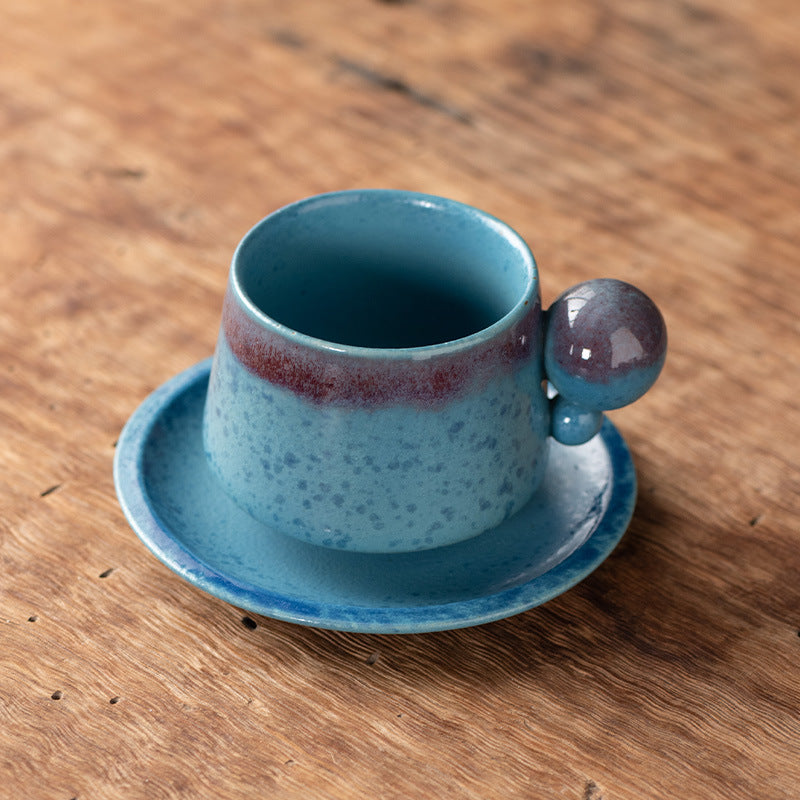 Orb-Handled Harmony – Handcrafted Kiln-Change Porcelain Coffee Cup & Saucer Set