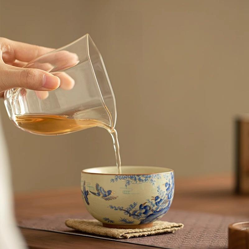 Joy Rising – Handcrafted Porcelain Tea Cup with Magpie & Plum Motif