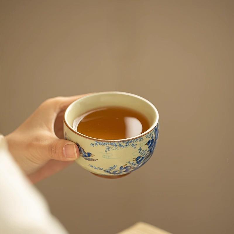 Joy Rising – Handcrafted Porcelain Tea Cup with Magpie & Plum Motif