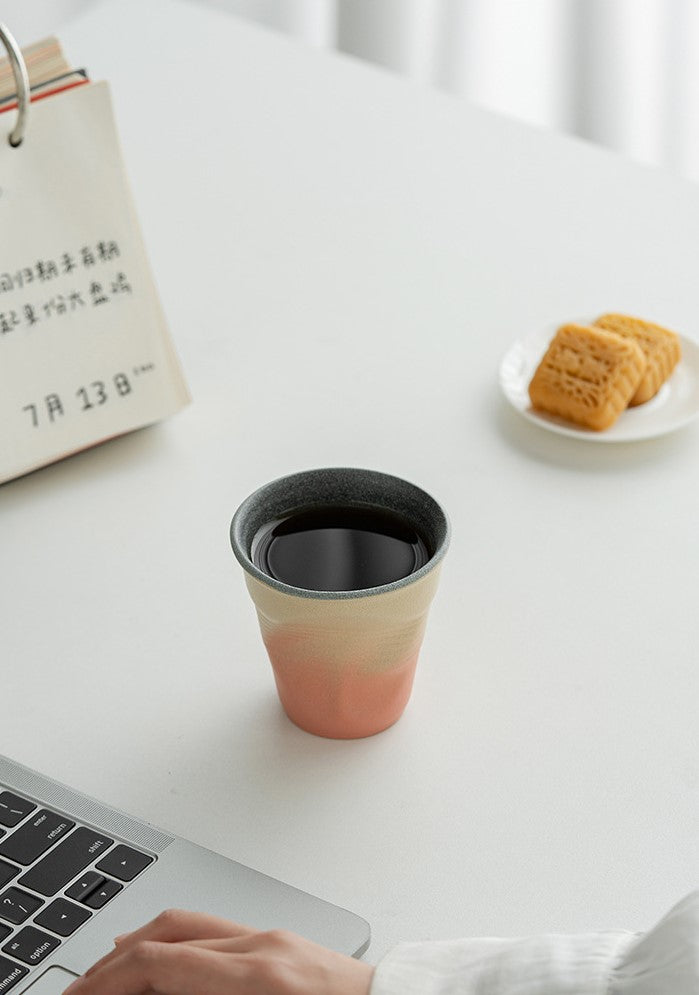 Folded Echo – Handcrafted Ceramic Coffee Cup with Origami Texture