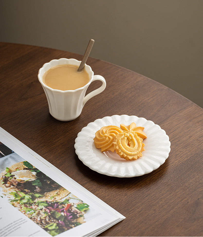 Blossom Whispers – Handcrafted Porcelain Coffee Cup & Saucer Set