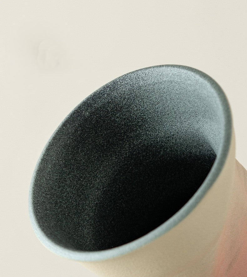 Folded Echo – Handcrafted Ceramic Coffee Cup with Origami Texture