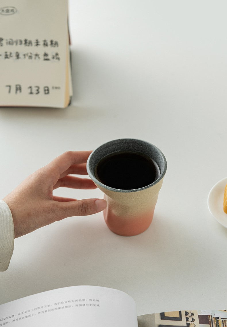 Folded Echo – Handcrafted Ceramic Coffee Cup with Origami Texture