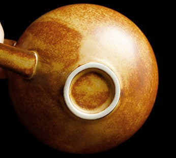 Amber Nest – Handcrafted Egg-Shaped Ceramic Coffee Cup with Saucer