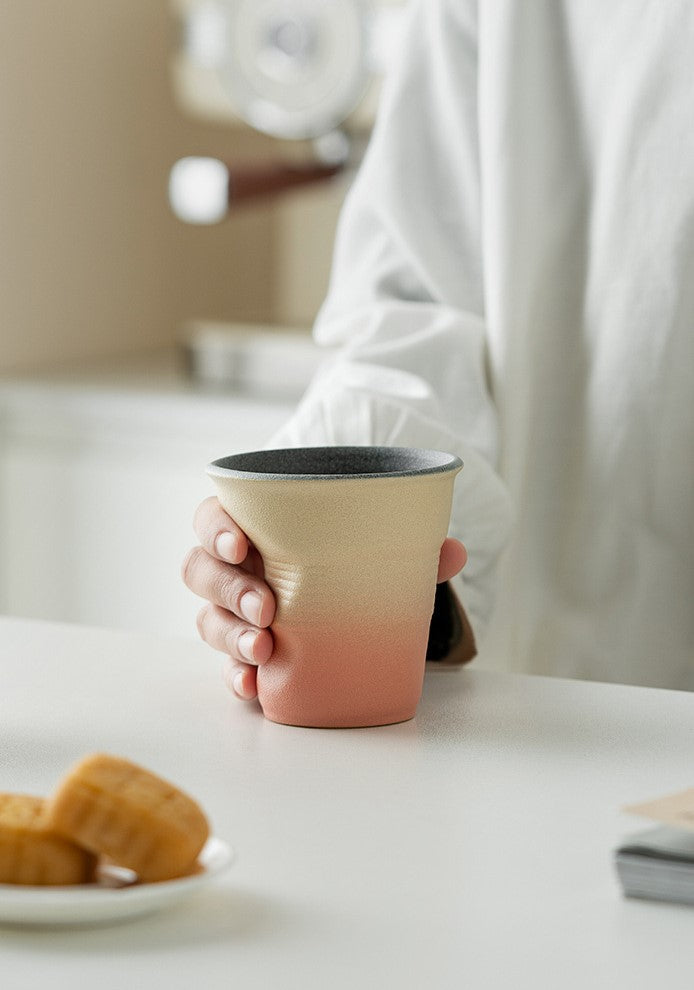 Folded Echo – Handcrafted Ceramic Coffee Cup with Origami Texture