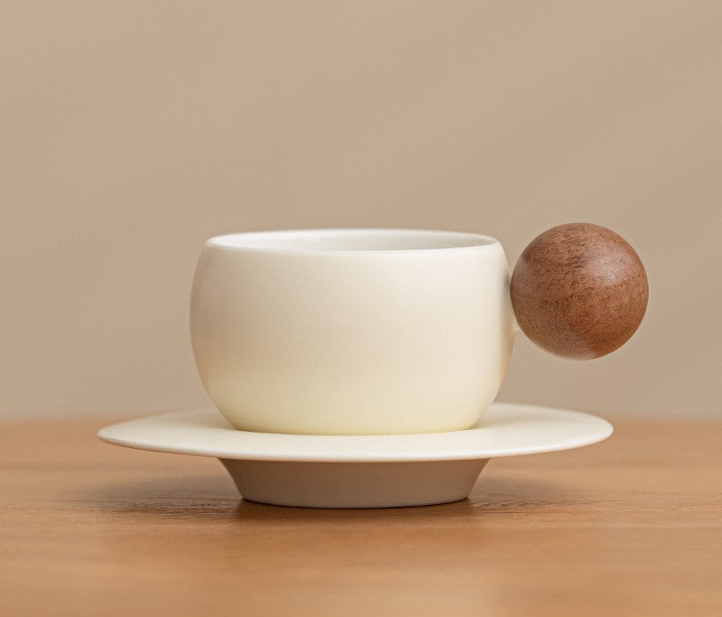 Orb Harmony – Handcrafted Ceramic Coffee Cup with Wooden Handle & Saucer