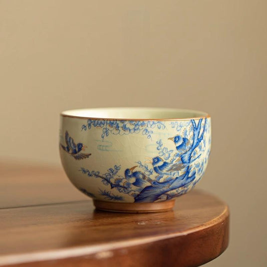 Joy Rising – Handcrafted Porcelain Tea Cup with Magpie & Plum Motif